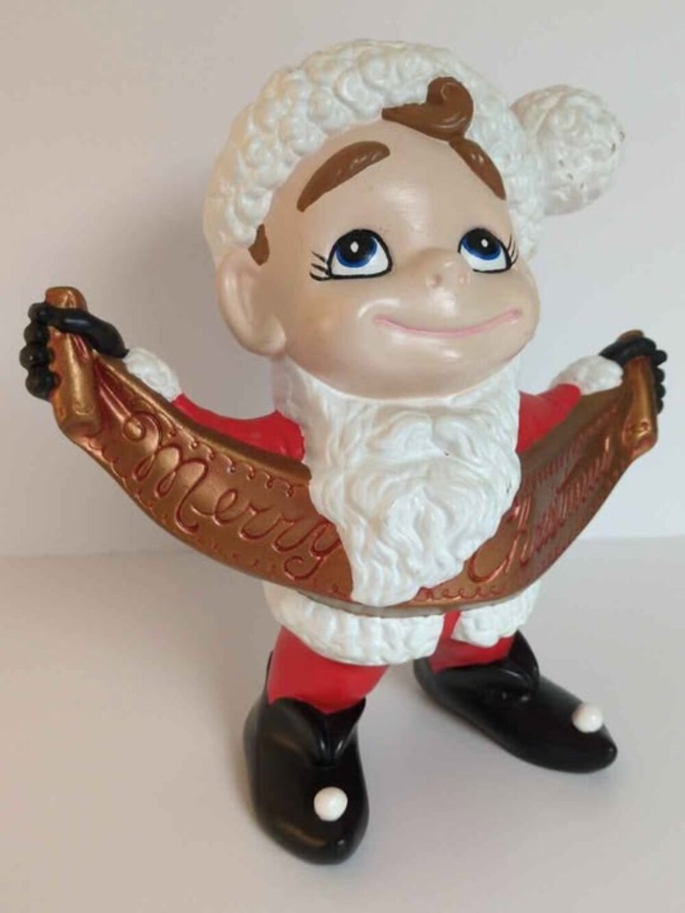 Vintage Ceramic Santa Claus Figurine with Merry Christmas Banner